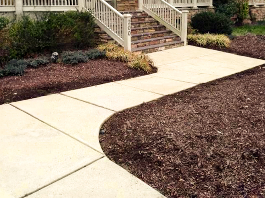 Power washing sidewalks for commercial and residential properties in Olathe Kansas